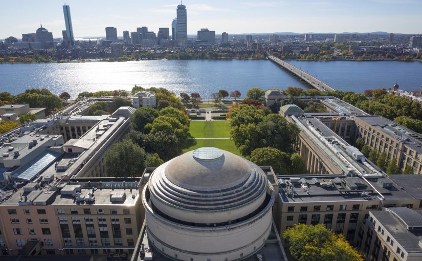 MIT dome aerial view with Charles River and Boston skyline
